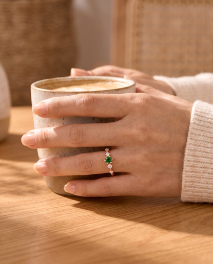 Gaia Ring worn with a coffee cup