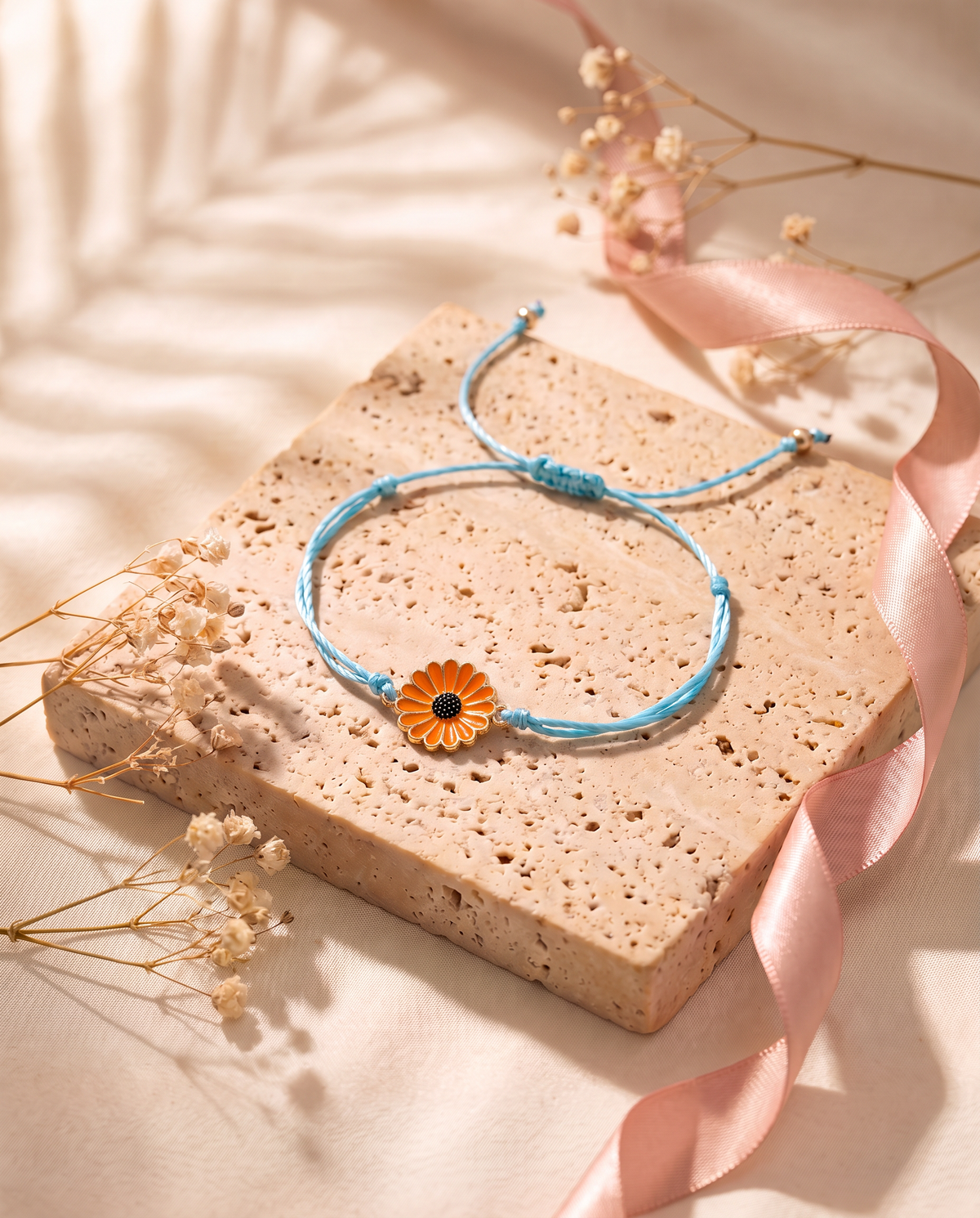 Chrysanthemum Lullaby orange daisy, blue cord